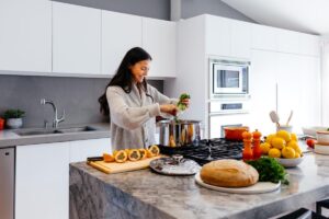 woman making a meal while on semaglutide